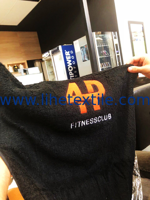 Wholesale customized 100% cotton embroidered logo black towel gym sports towel with pocket