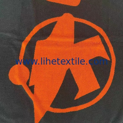 Free sample 100% cotton terry custom yarn dyed black and orange jacquard beach towel