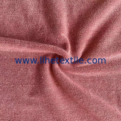 OEM custom luxury 100% cotton plain embossed  logo design beach towel with tassel